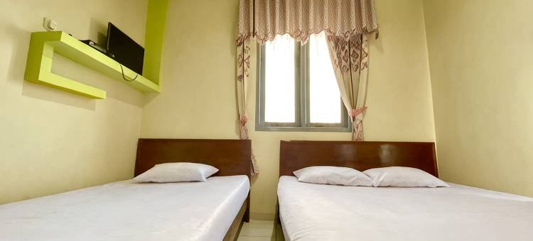 红色伙伴迪恩斯里坎迪伊斯兰家庭旅馆(Homestay Srikandi Syariah Dieng RedPartner)图片
