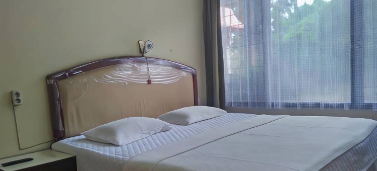 奥利伯特帕拉帕特阿吉巴塔米特拉红门酒店(Hotel Olibert Parapat Ajibata Mitra RedDoorz)图片