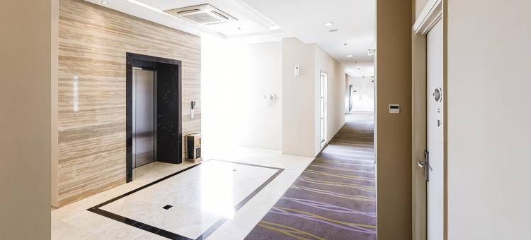 惠里普瑞米尔酒店(W Three Premier Hotel Lagaligo)图片