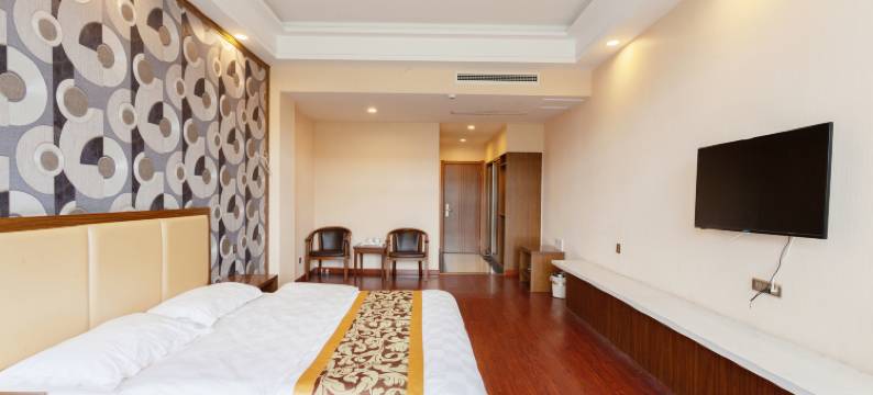 万华晟居宾馆(蓬莱新汽车站店)图片