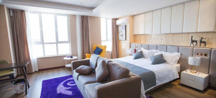 包头月半湾主题酒店(团结大街店)图片