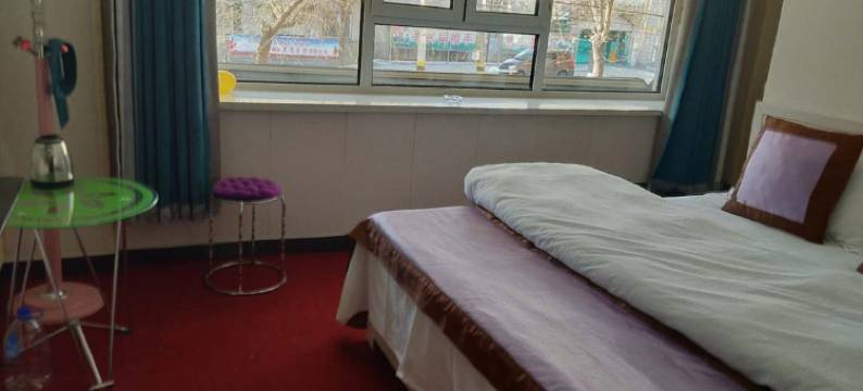 牡丹江鑫时钟快捷旅馆(黑龙江商业职业学院东校区店)图片