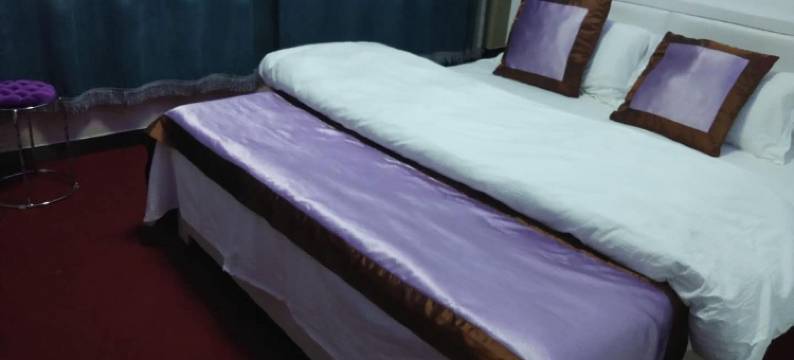 牡丹江鑫时钟快捷旅馆(黑龙江商业职业学院东校区店)图片