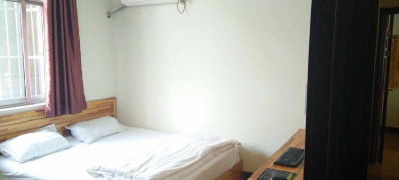 新泰居家宾馆图片