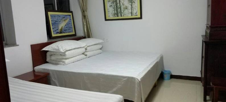 荣成渔舟唱晚海草房客栈图片