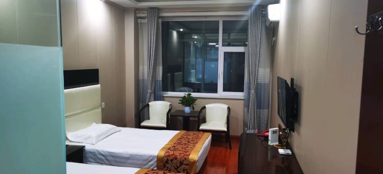 河曲鸣三省商务酒店图片