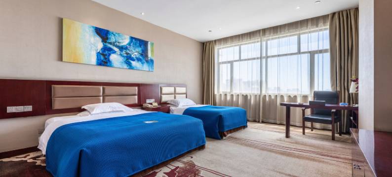 明华大酒店(阿克苏金兰广场天百时尚购物中心店)图片