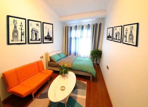 兴义上名精品公寓