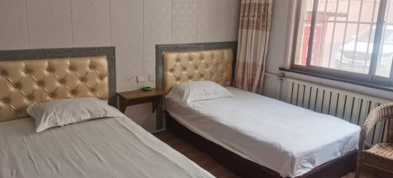 青岛家暖宾馆图片