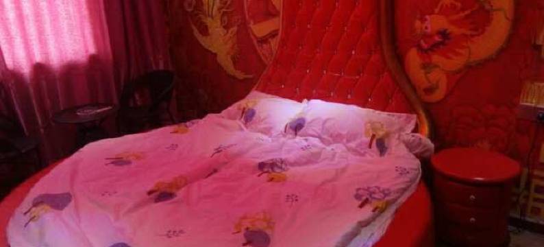 梁山怡馨主题公寓图片