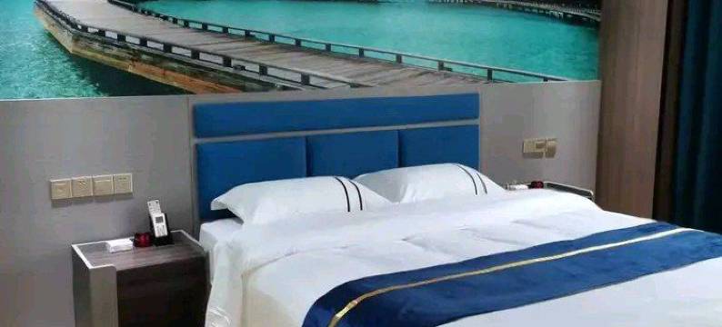 威宁水岸花开精品酒店(会展中心店)图片