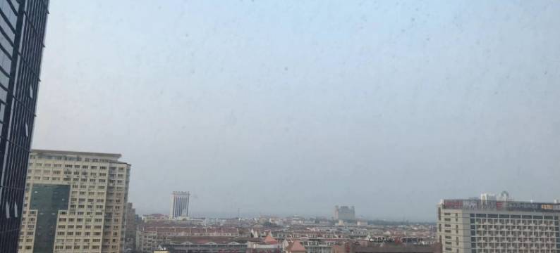 华人易居公寓(烟台福海路店)图片