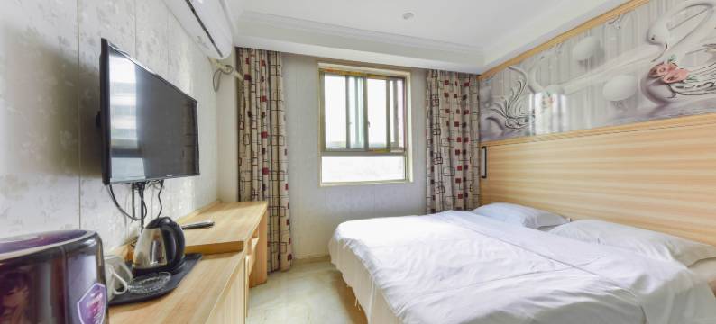 深圳客8宾馆(莲塘地铁站仙湖植物园店)图片