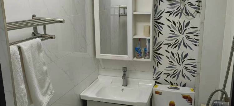 新民鑫比家馨便捷旅馆图片