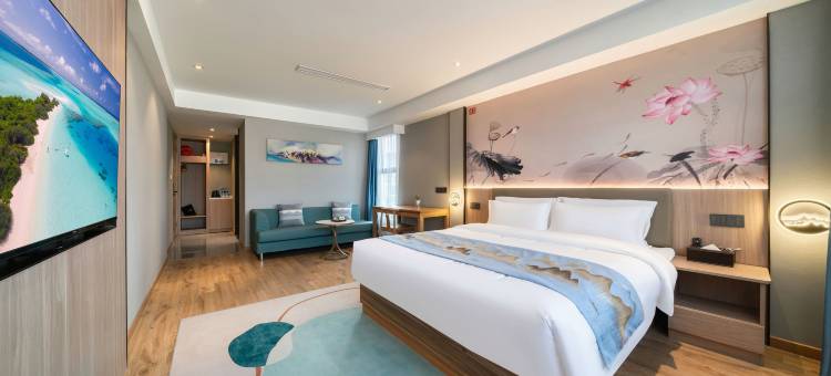 嵊州琴漫酒店(吾悦广场国际会展中心店)图片