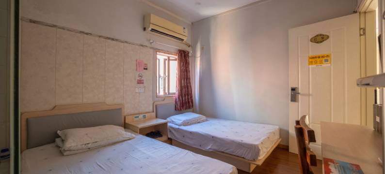 苏州圆石小歇主题宾馆(苏州科技大学石湖校区店)图片