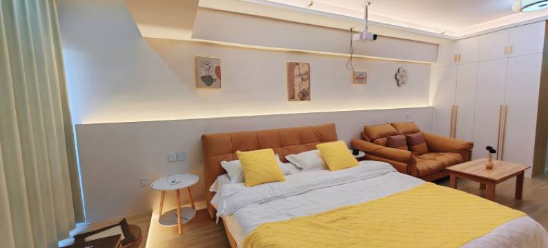 暖幢·艺术城宿(哈尔滨西站万达广场店)图片