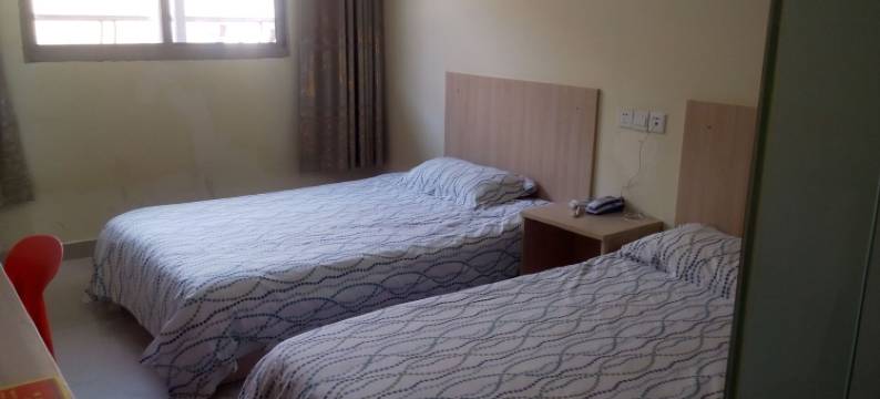 丁丁酒店(上海华夏东路地铁站店)图片