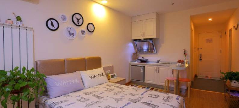 鑫龙假日酒店(黄岛金沙滩旅游度假区井冈山路地铁站店)图片