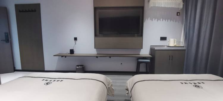 万荣爱家商务酒店图片