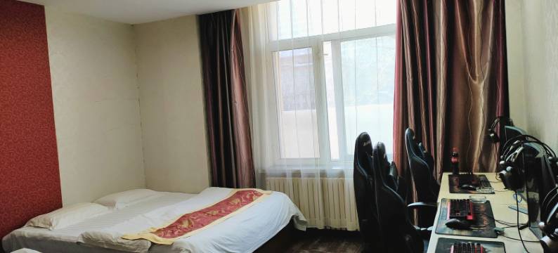 哈尔滨钱柜时尚宾馆(黑龙江中医药大学附属第一医院店)图片