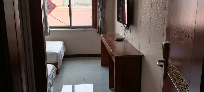 新明雪宾馆(岚山日百万德福店)图片