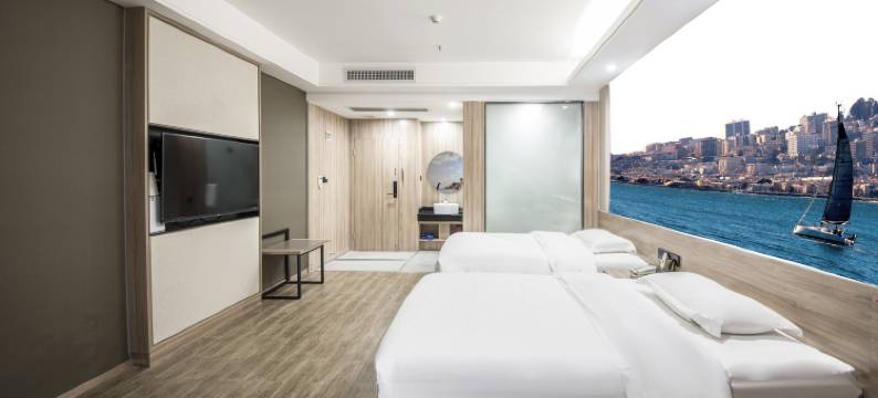 佛山迷你时空酒店(狮山广场南海体育中心店)图片