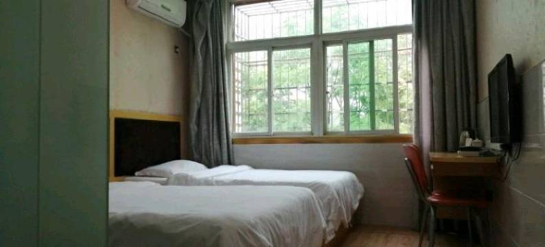 咸宁江南春天商务宾馆(湖北科技学院店)图片