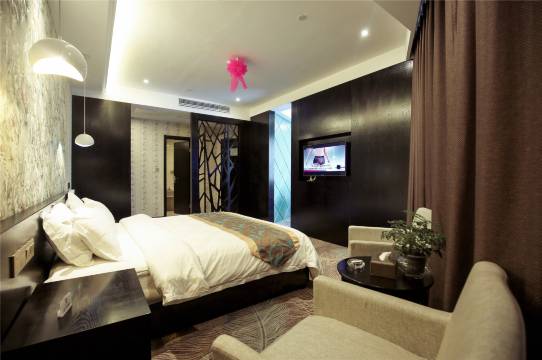 修水嘉美精品酒店