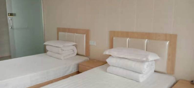 新世佳宾馆(阜阳市红旗中学店)图片