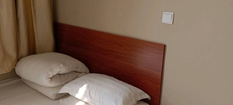 新明雪宾馆(岚山日百万德福店)图片