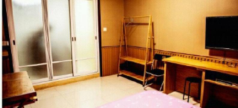 大连七彩阳光电影主题家庭旅馆图片
