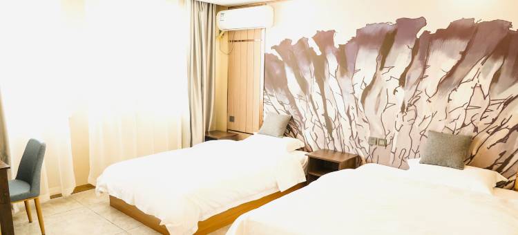 长春温卿雅居宾馆(奥林匹克公园工业大学北湖校区店)图片