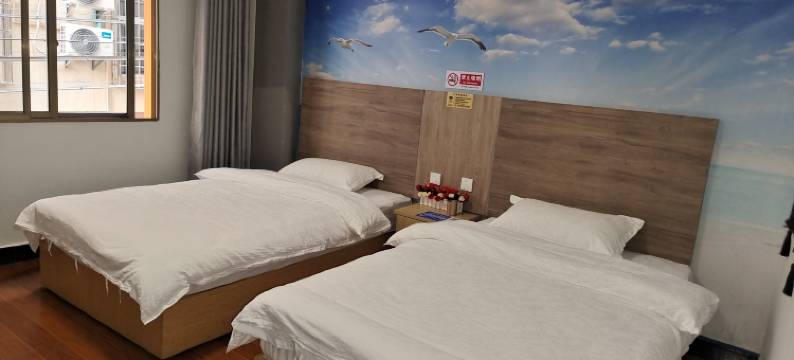 芒果御园酒店(景洪曼听公园店)图片