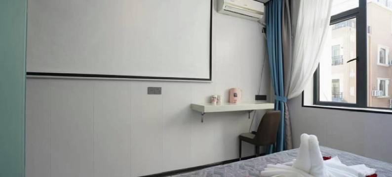 北海银滩逸龙影音酒店(国际客运港码头店)图片