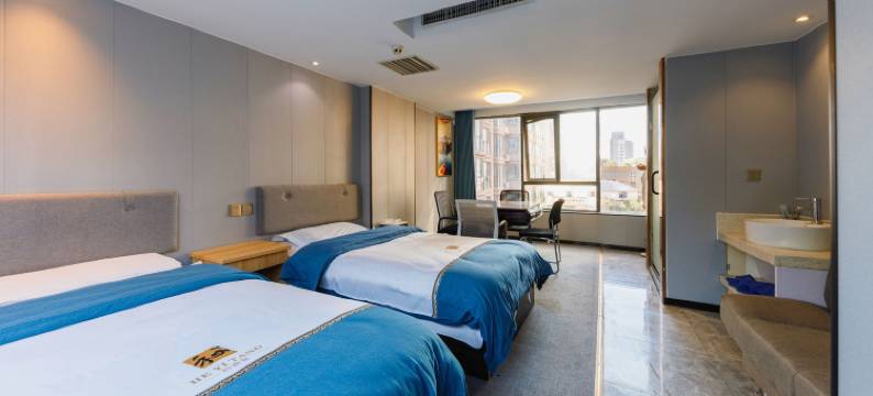 七禧轻居酒店(省体育中心店)图片