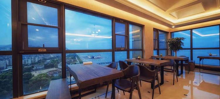 舟山橙子酒店(普陀山机场半升洞码头店)图片