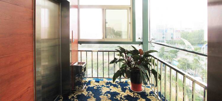 海龙田园宾馆(许昌曹魏古城胖东来时代广场店)图片