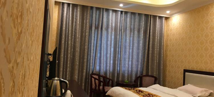 新龙梁昂孜荣大酒店图片