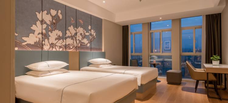 白玉兰商务酒店(焦作远大未来城高铁站店)图片