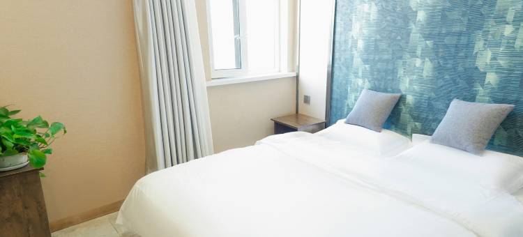 长春温卿雅居宾馆(奥林匹克公园工业大学北湖校区店)图片