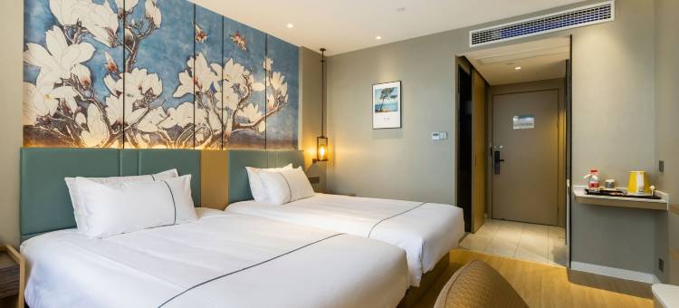 白玉兰酒店(枣庄高铁站六盘山路店)图片