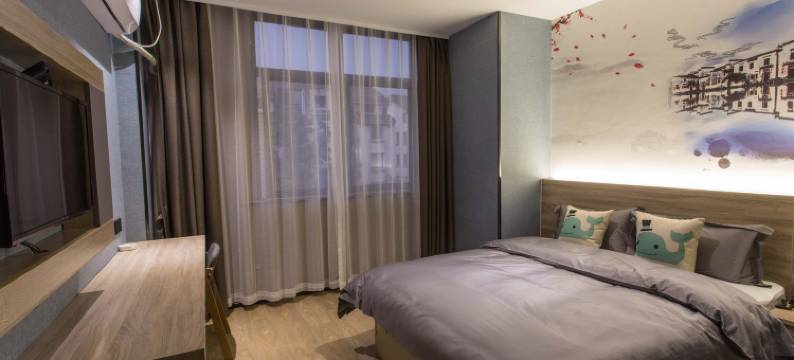 张家港迷白艺术酒店(大成广场店)图片