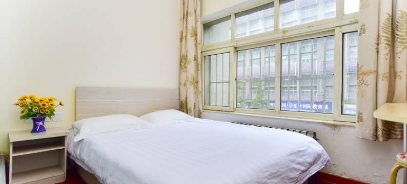 青岛城市客房宾馆图片