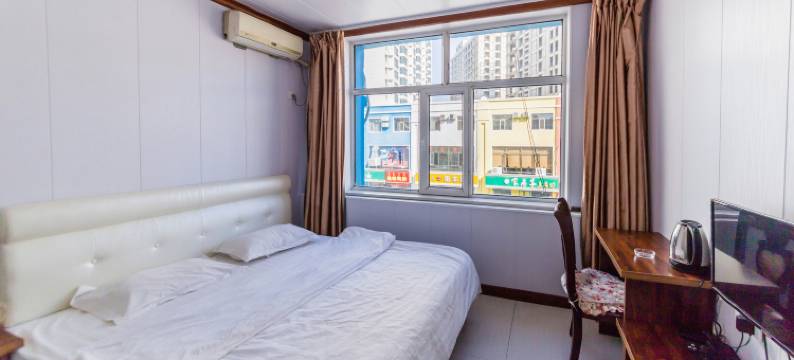 呼和浩特新怡家旅馆图片