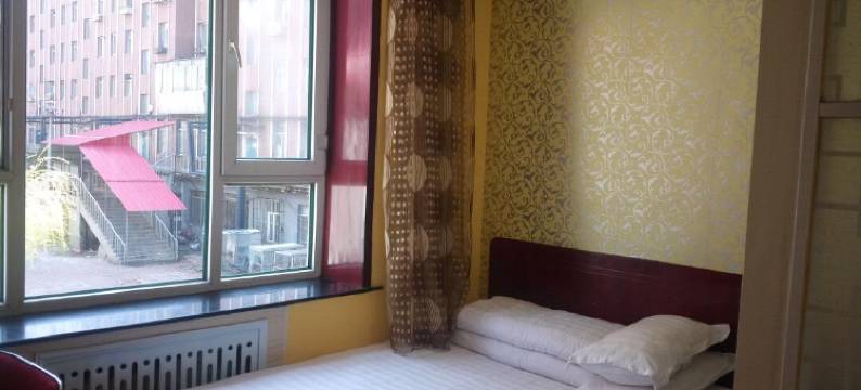 临江喜洋洋时尚旅馆图片