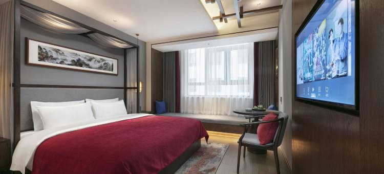 仟那千寻酒店(开封清明上河园星光天地购物中心店)图片