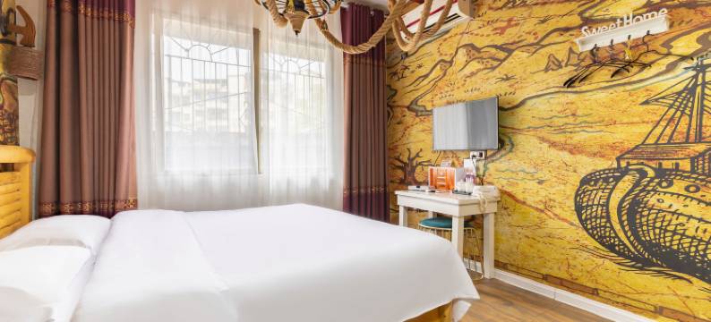 铜仁蜗居主题酒店图片