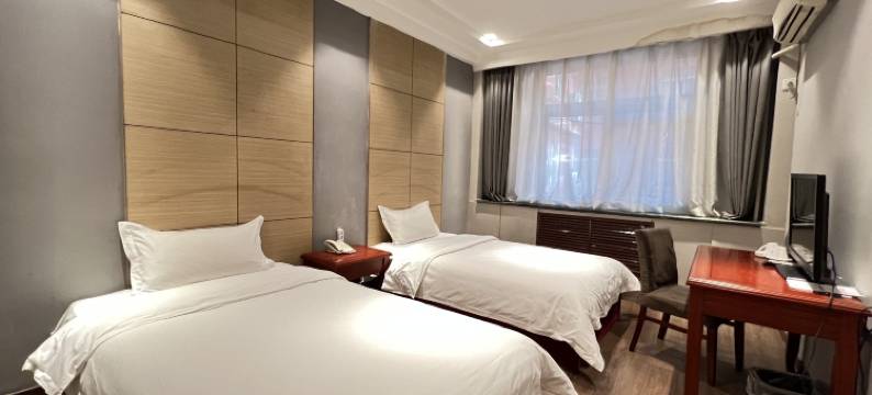 富强商务酒店(海城站前街店)图片