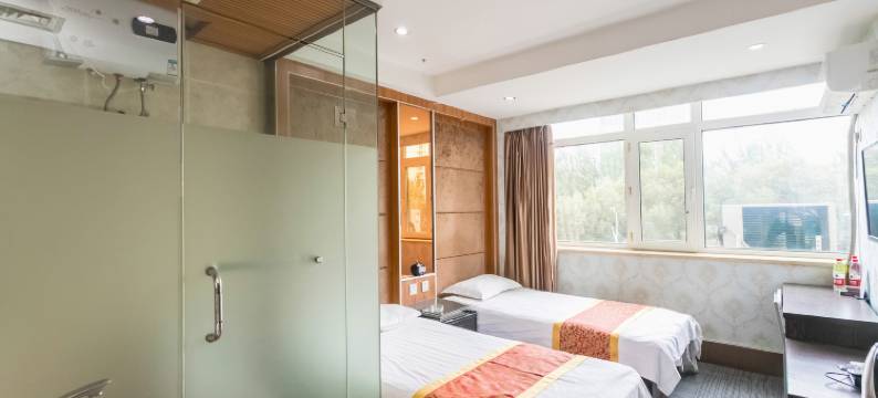 金芒果快捷宾馆(哈尔滨学府凯德广场师大夜市店)图片